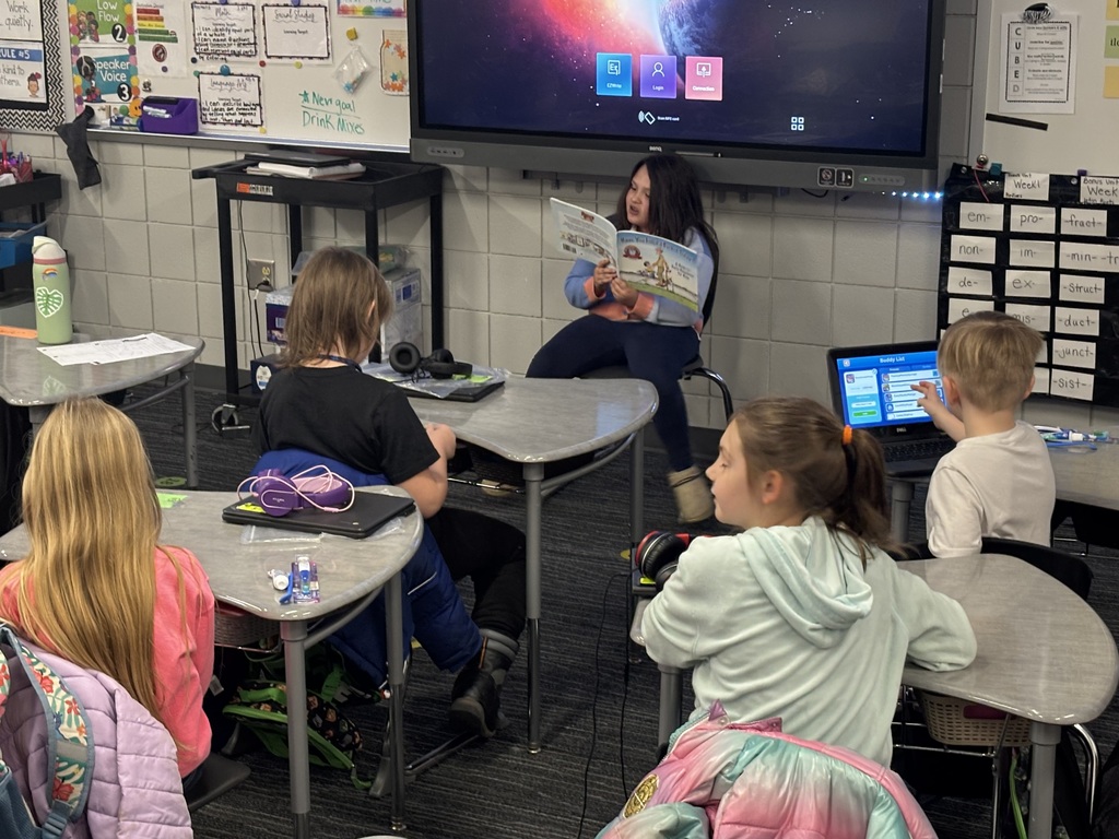 3rd grade leaders reading to other classes