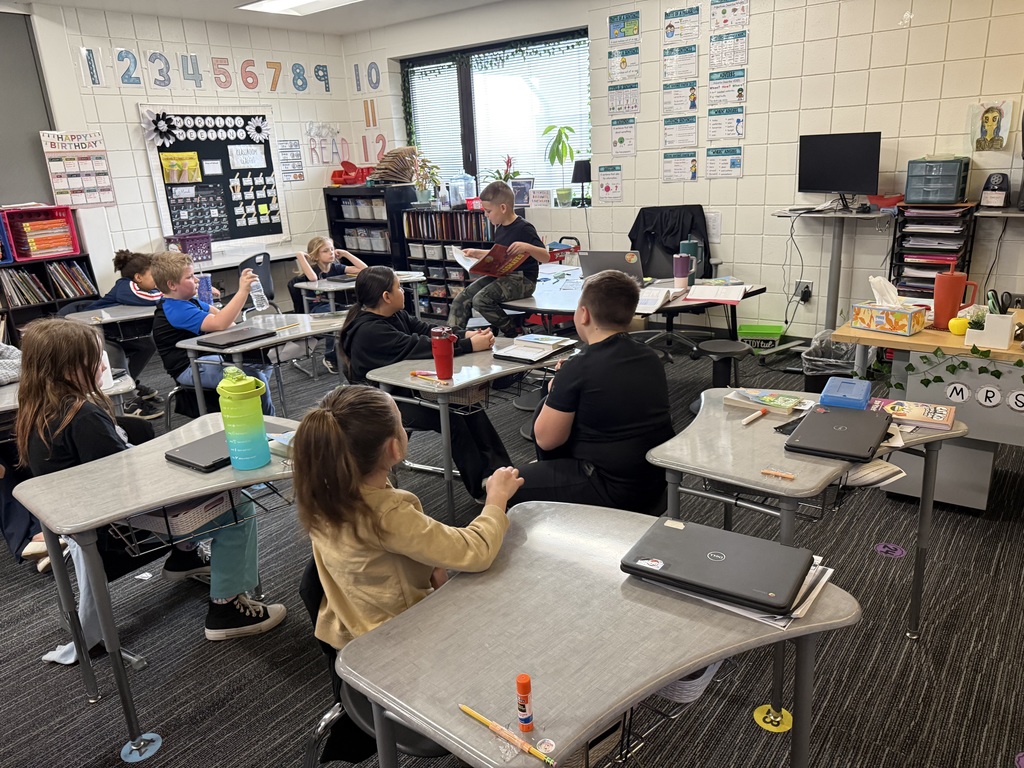 3rd grade leaders reading to other classes