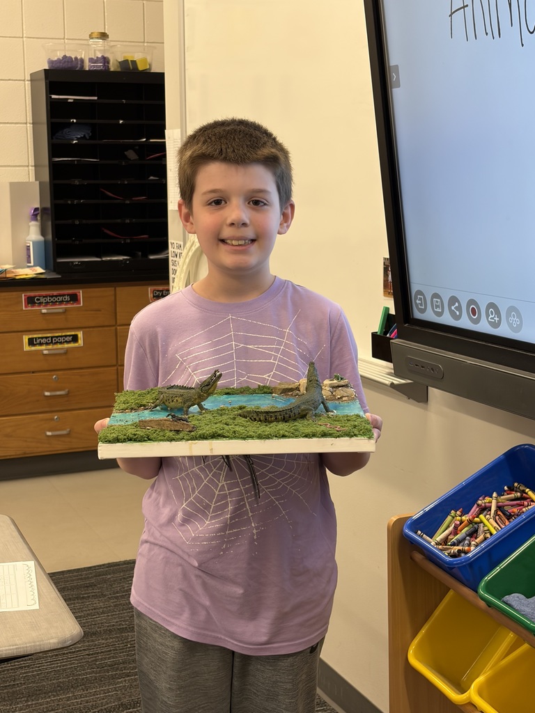 4th grade student doing a habitat presentation