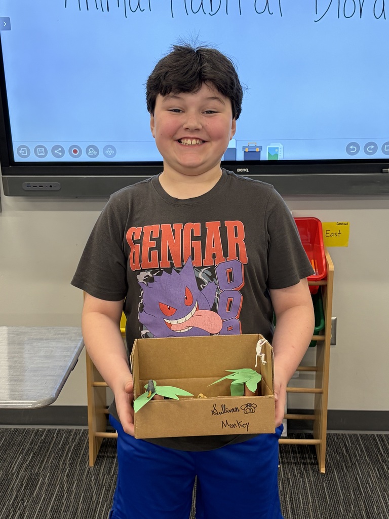 4th grade student doing a habitat presentation
