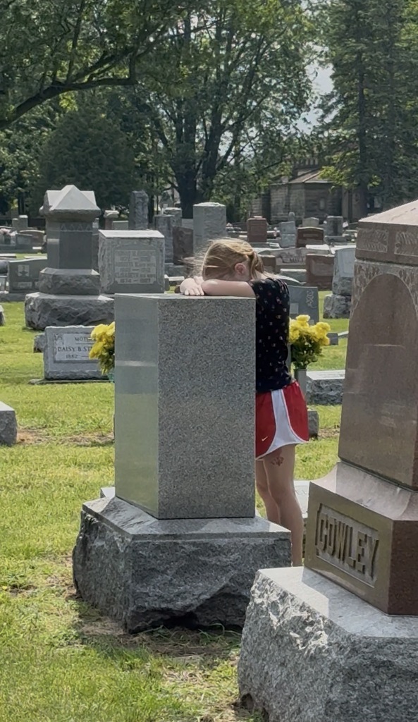 students saying "thank you" as they plant flags for Memorial Day