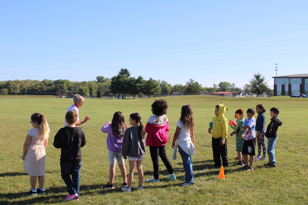 Ms. Newlove's PE Class learning how to play football