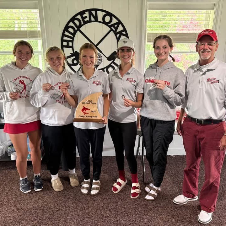 girls golf team with trophy at St. Louis
