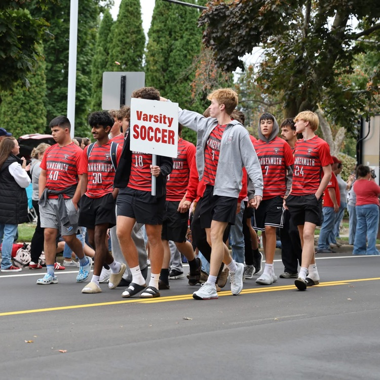 soccer team walks in parade