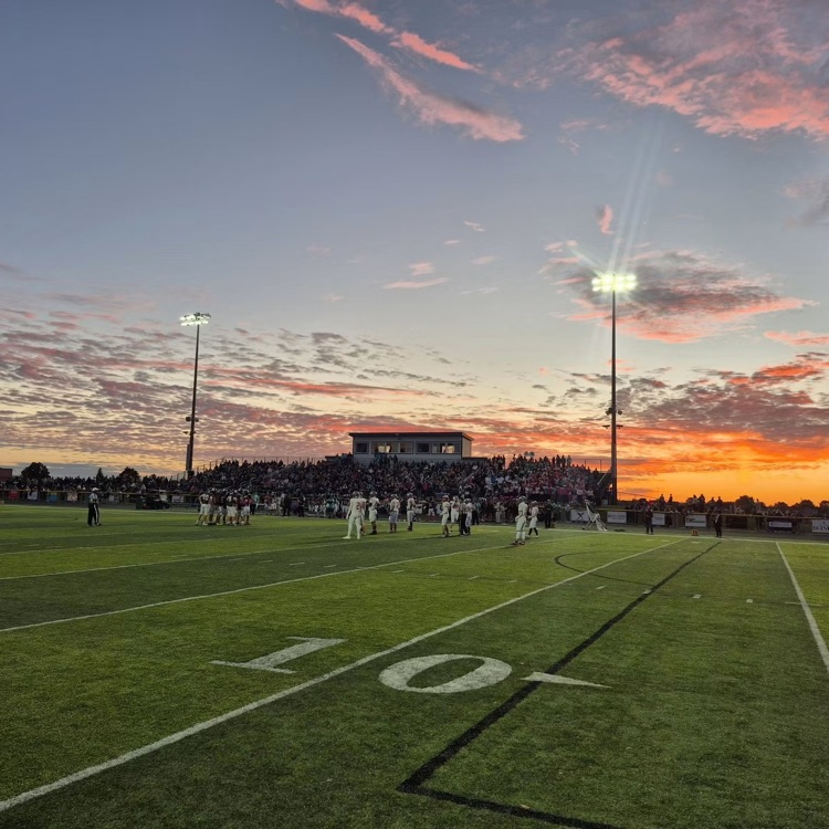 Frankenmuth football game at Freeland field at sunset
