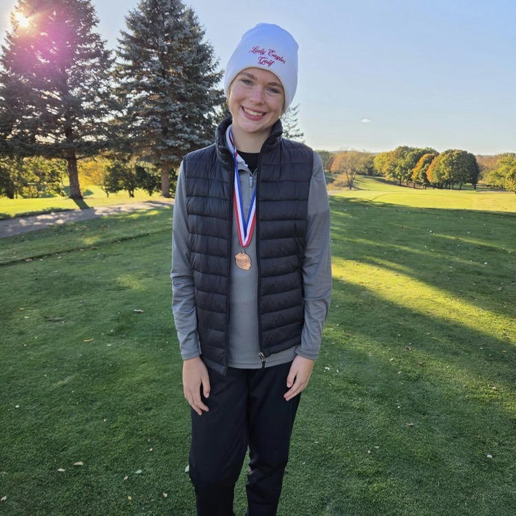 Maxie Schmidt with her MHSAA metal