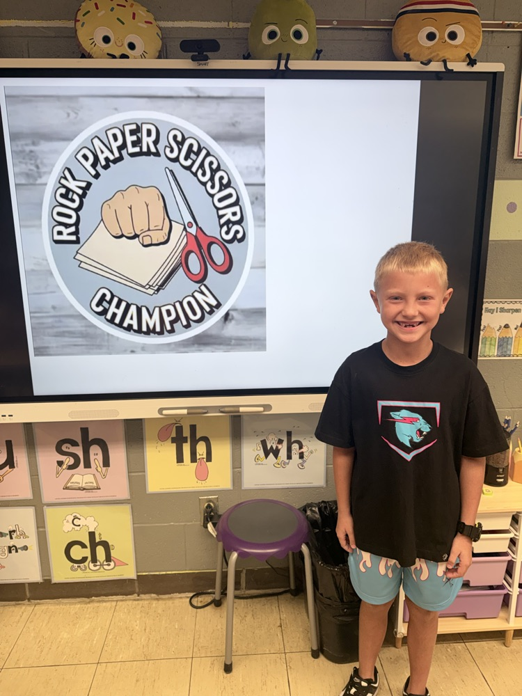 Emmett-rock paper scissors champ 