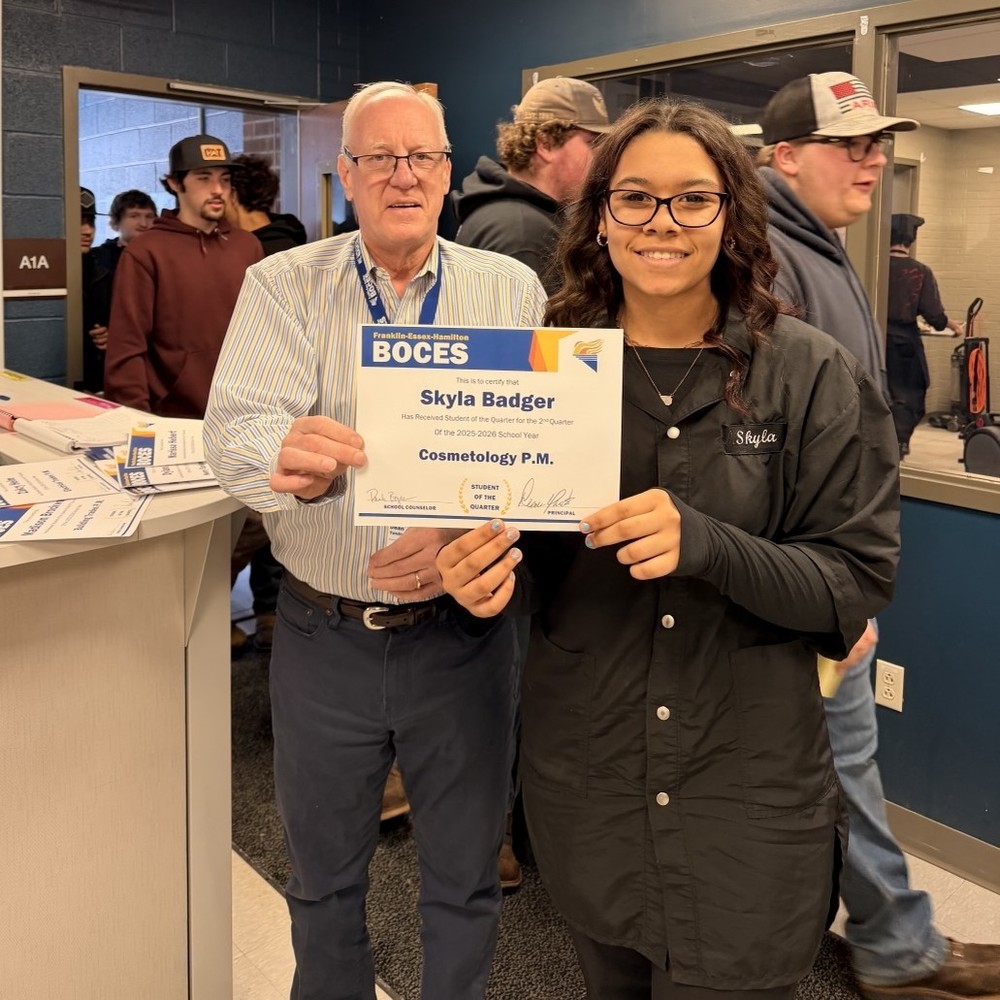 Skyla Badger holds certificate