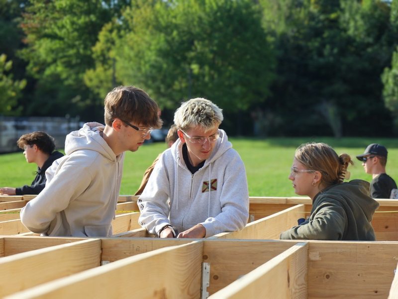 Students working on modular home