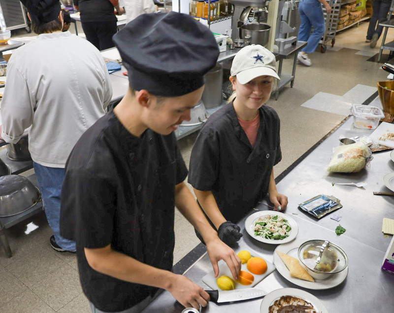 Teamamtes, Blake and Brooke working on their meal