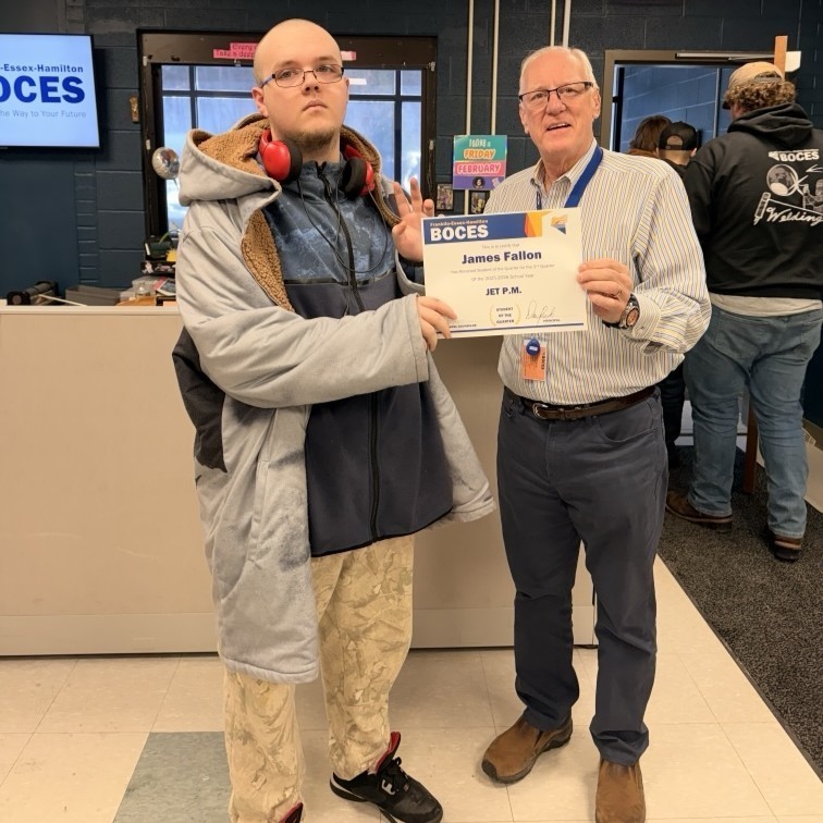 James Fallon holds award