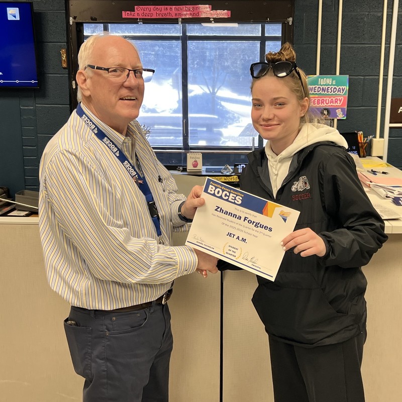 Zhanna Forgues holds certificate