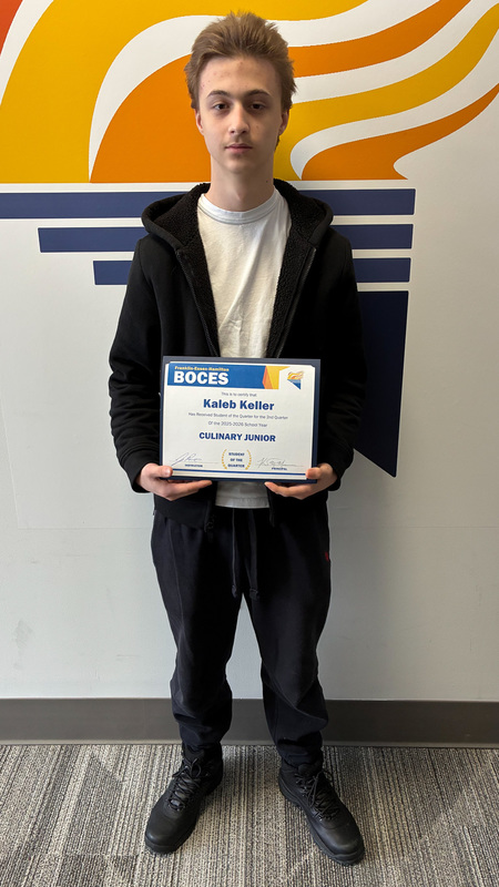 Keller holds certificate