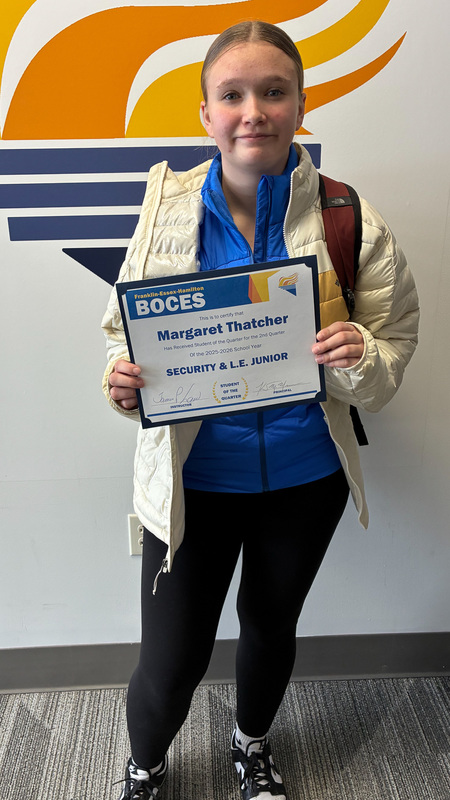 Thatcher holds certificate