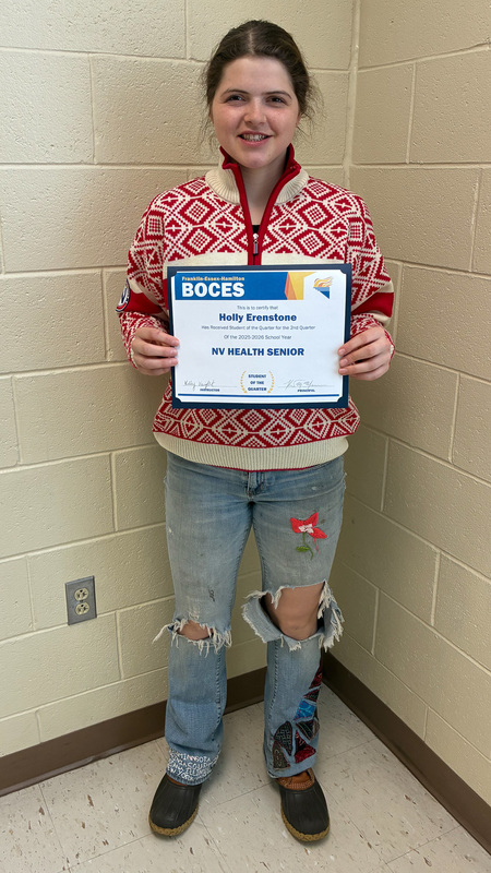 Erenstone holds certificate