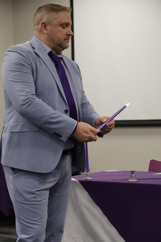 CTE Director Shawn McMahon lights NTHS candle