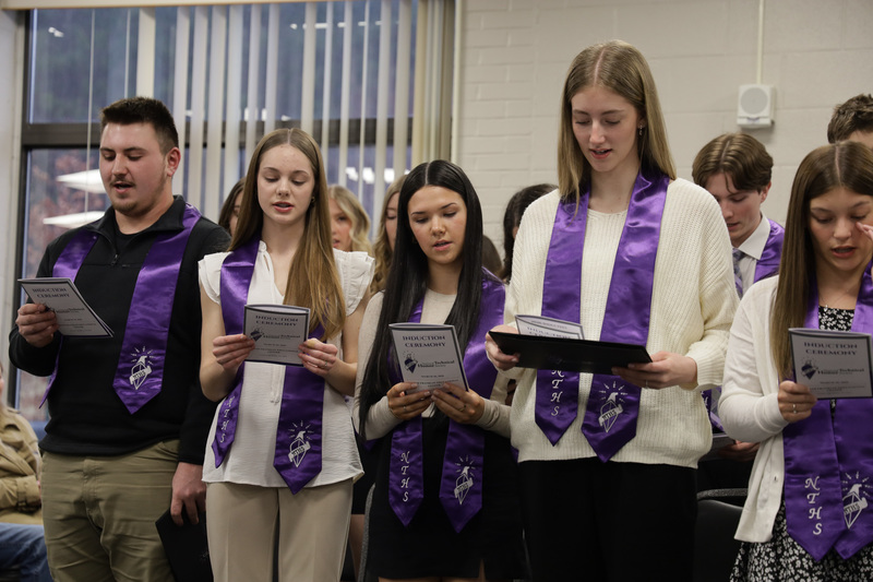 inductees reciting pledge