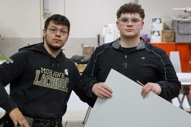 building trades students take photo together