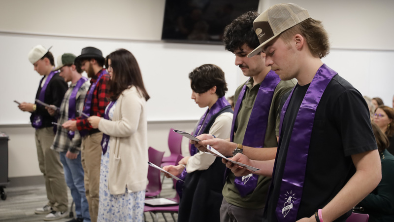 NTHS inductees reciting the NTHS pledge