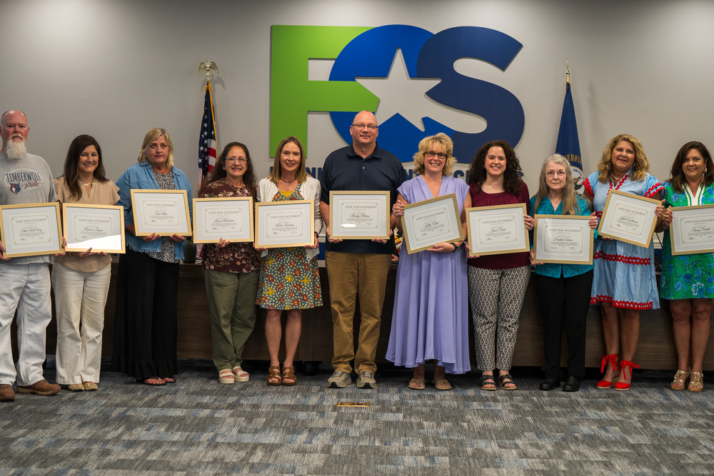 Retirees in the board room.