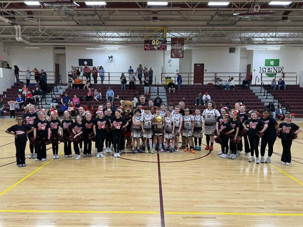 CLE cougars and cheelearders, 2026 boys champions in EMS gym