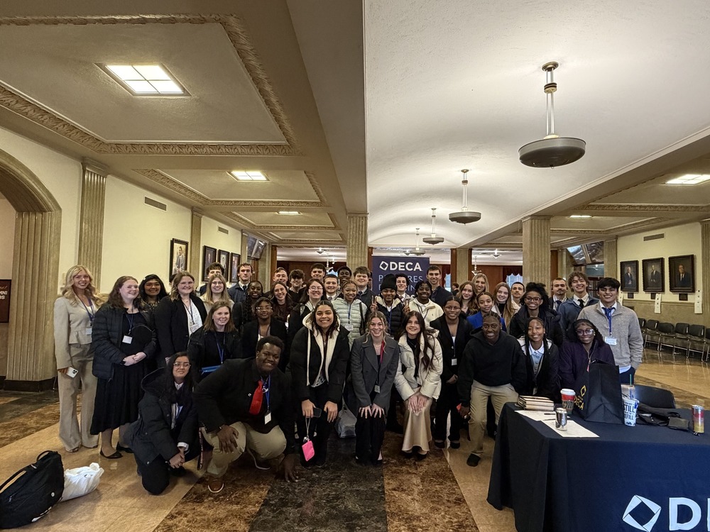 FCHS DECA members in a hotel conference center