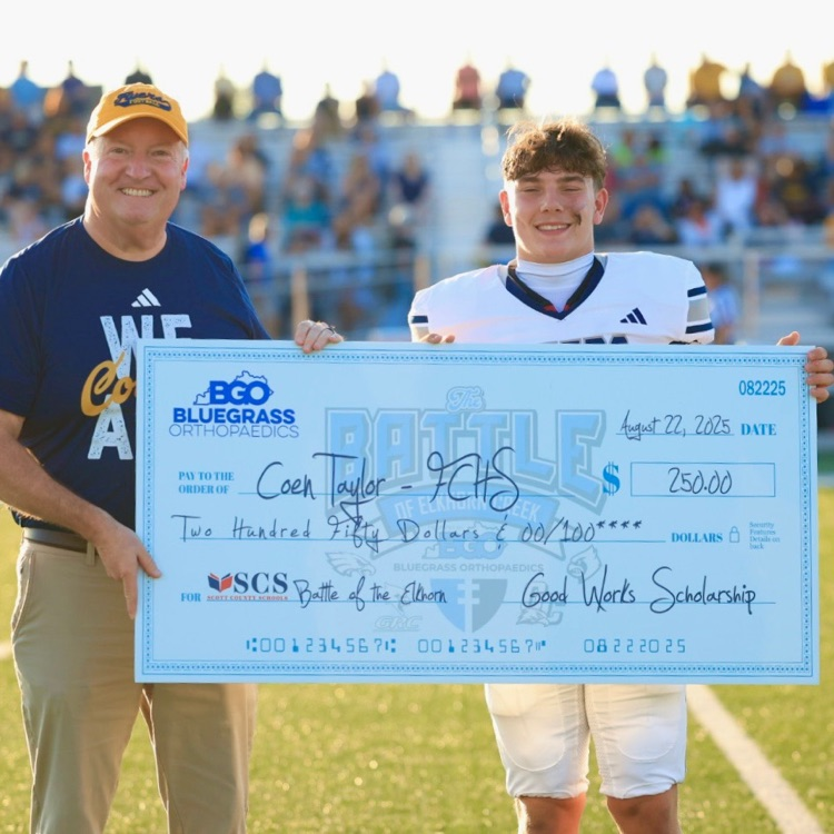 mark and Cole with check