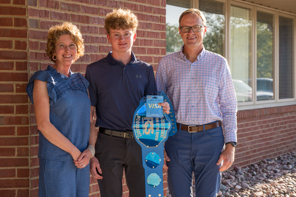 Henry with Family outside of FCS Central Office