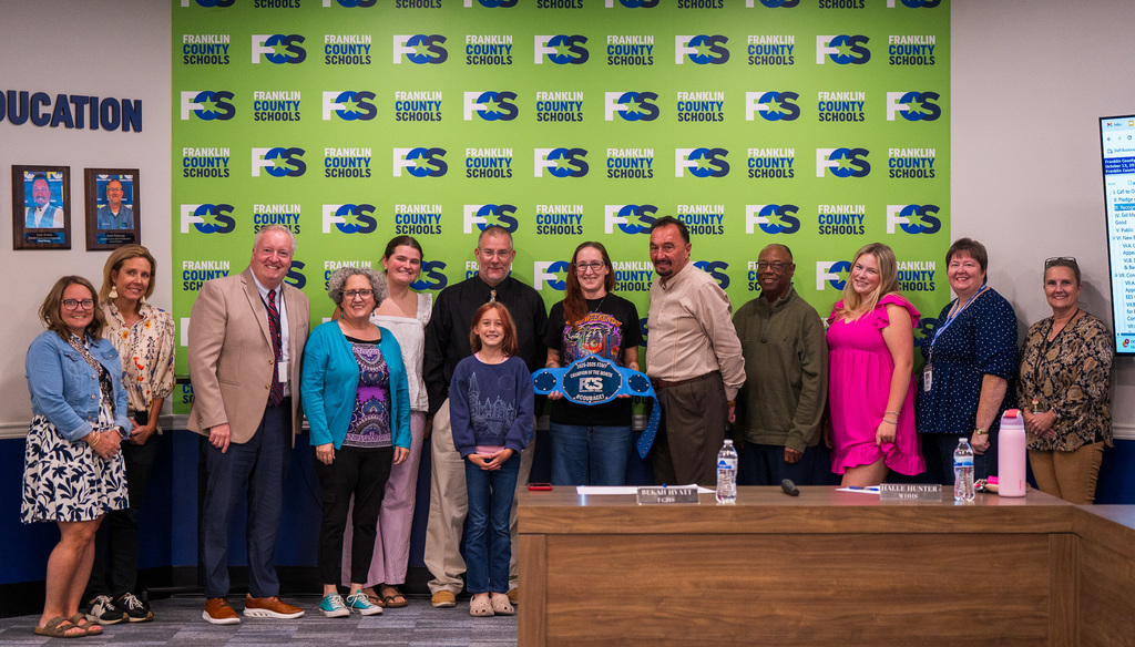 Samantha Dedrickson, with board. OCTOBER 2025 champ of the month.