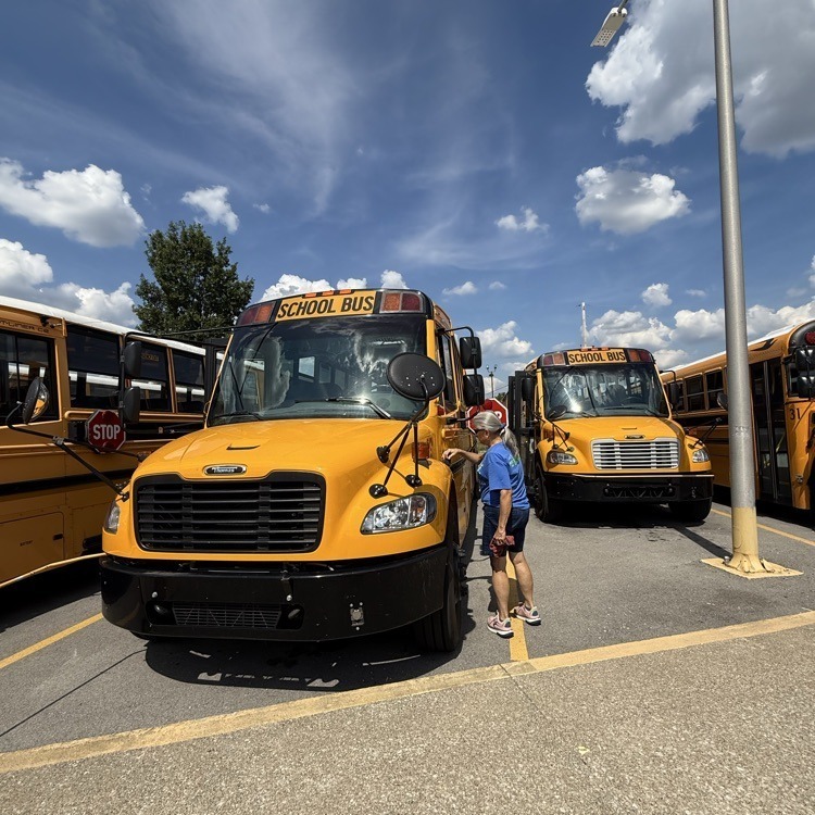 bus driver checking the bus