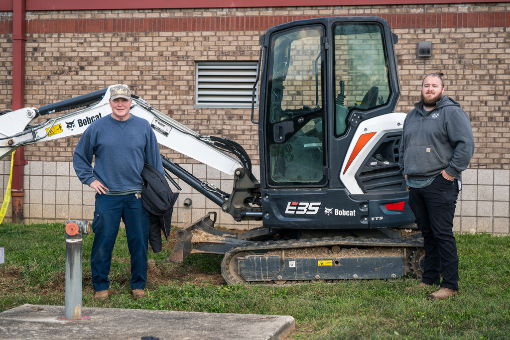 rodeny and mason in front of bobact outside of westrdige 