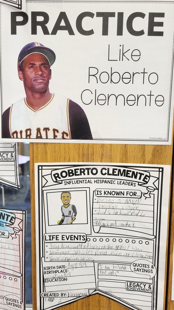 Student work sample hangs on a wall. Topic: Roberto Clemente