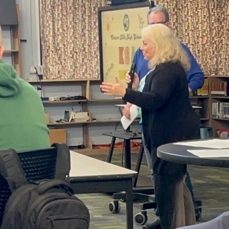 Lori receiving award