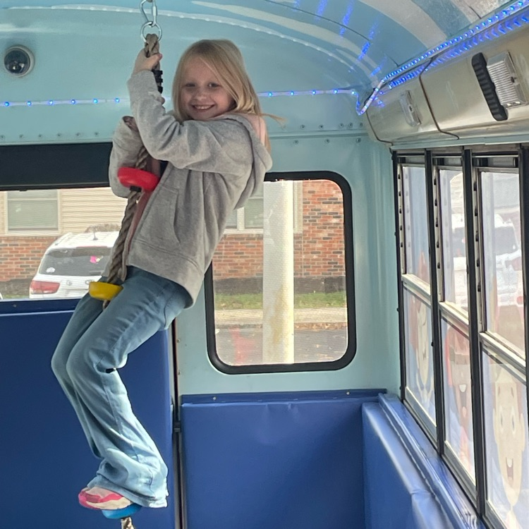 child on the rope climb
