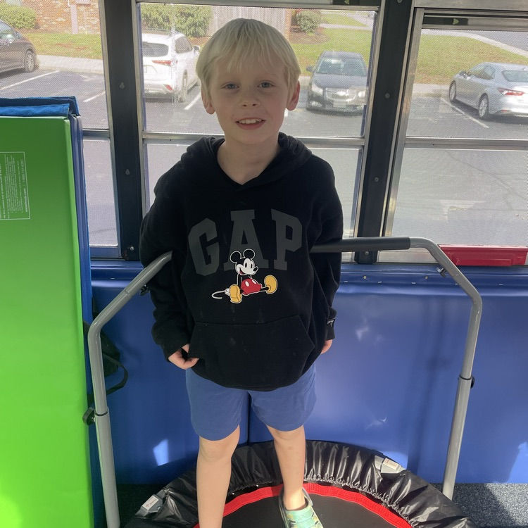 child on trampoline