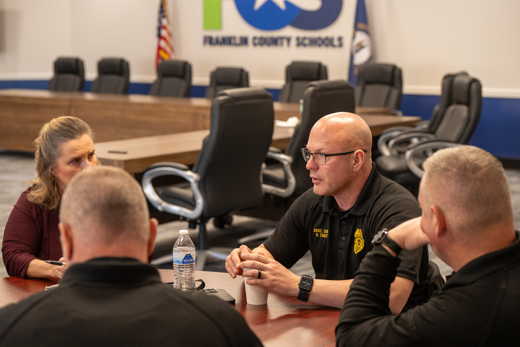 Key Coms members in our board room. 