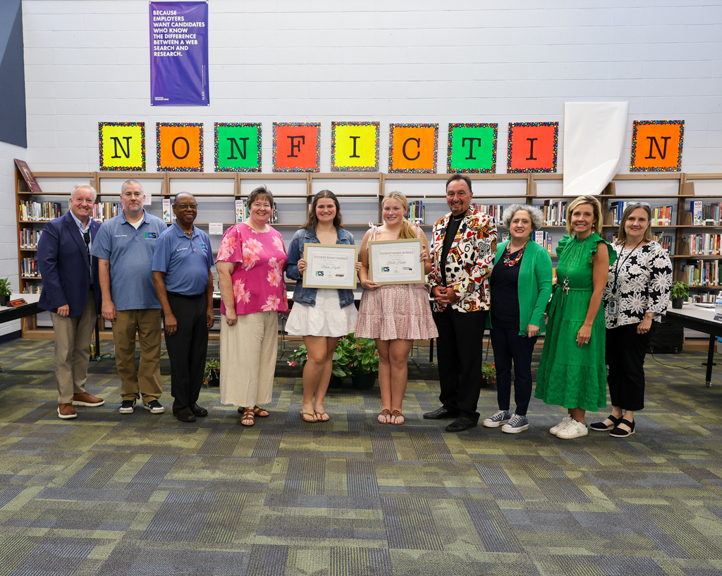 The school board recognizes our student board members.