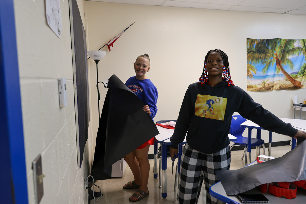 Students and staff at Bondurant Middle School teamed up to get the school looking its best.