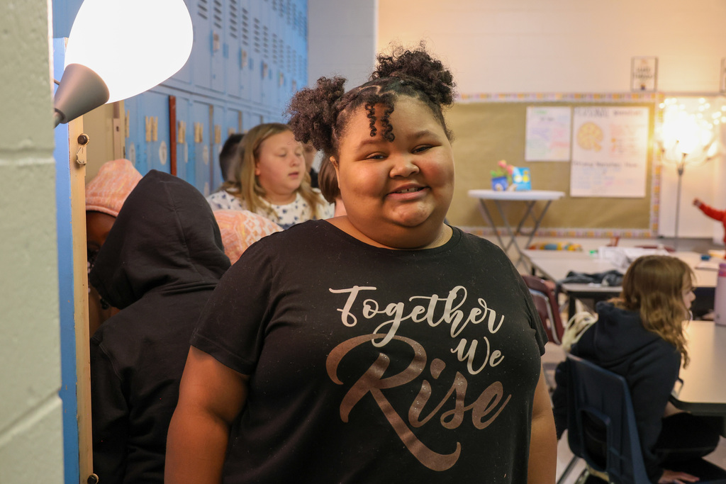 Student at Elkhorn Elementary School smiles at the camera.