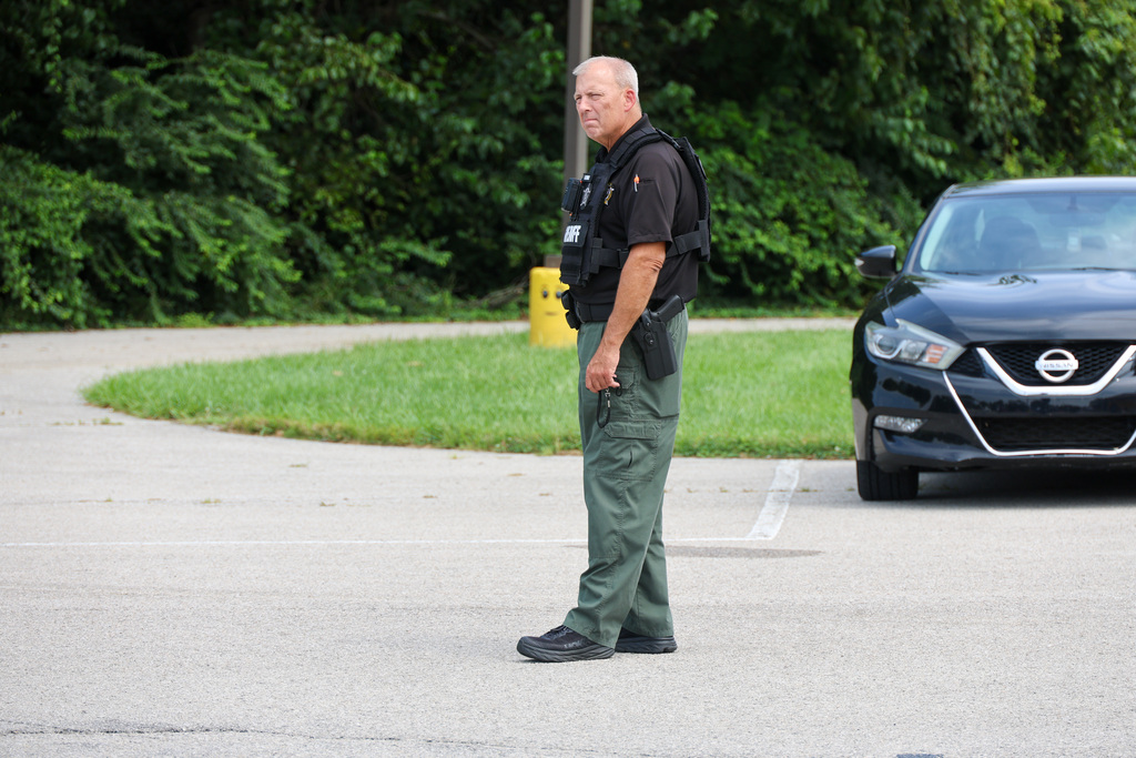 School Resource Officer directs traffic for dismissal at Elkhorn Elementary School.