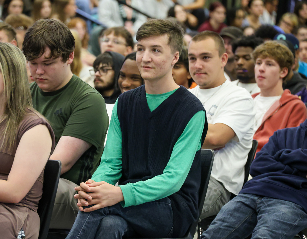 WHHS senior sits and listens attentively.
