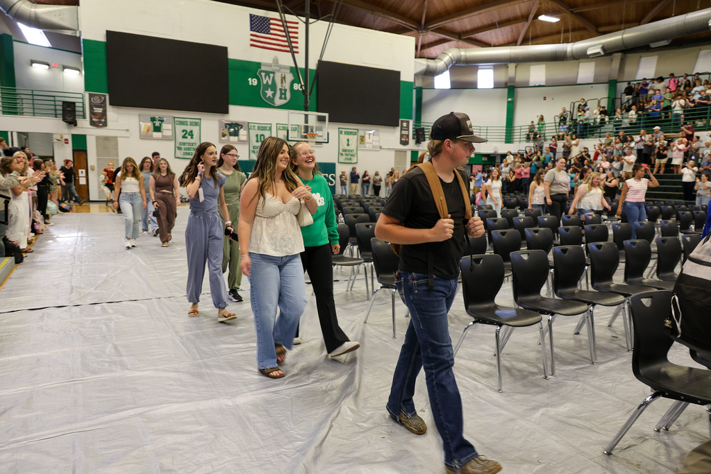 WHHS Seniors walk into the gym for the Senior Clap-in