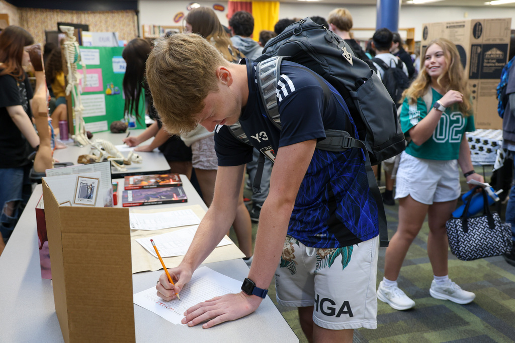 Student signs up for a club.