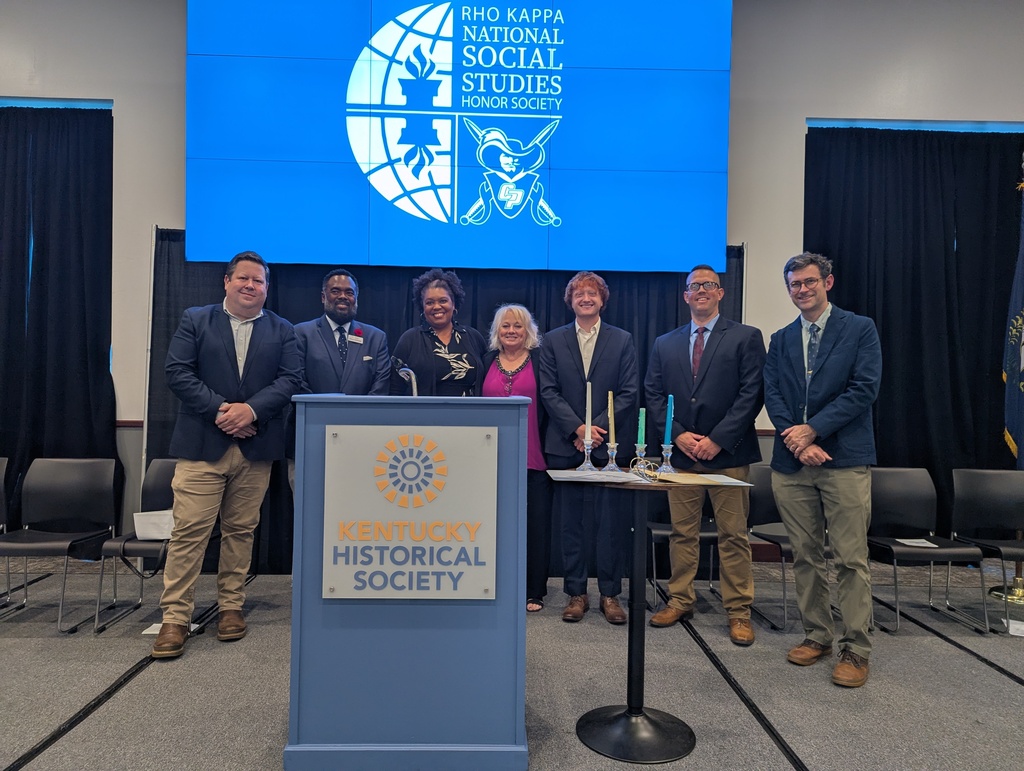 Retired Western Hills Social Studies Department Chair Vanessa Smith was honored for her key role in establishing the chapter and selecting its namesake. Smith joined current Social Studies Department Chair Matthew Graham, Rho Kappa Advisor Lorrie Fraley, and teachers Corey Stratton and Henry Hoffman