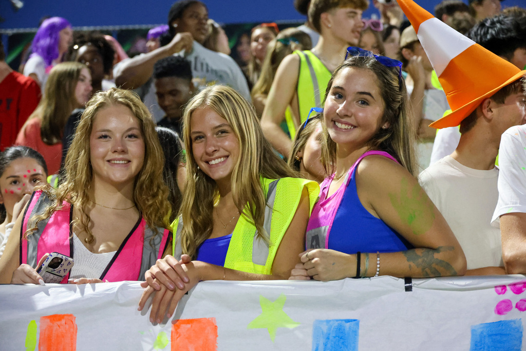 WHHS students smile in the stands.