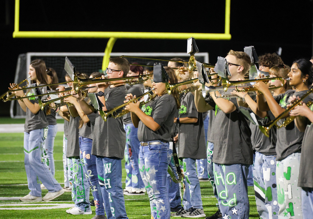 WHHS band performs during halftime on the field.