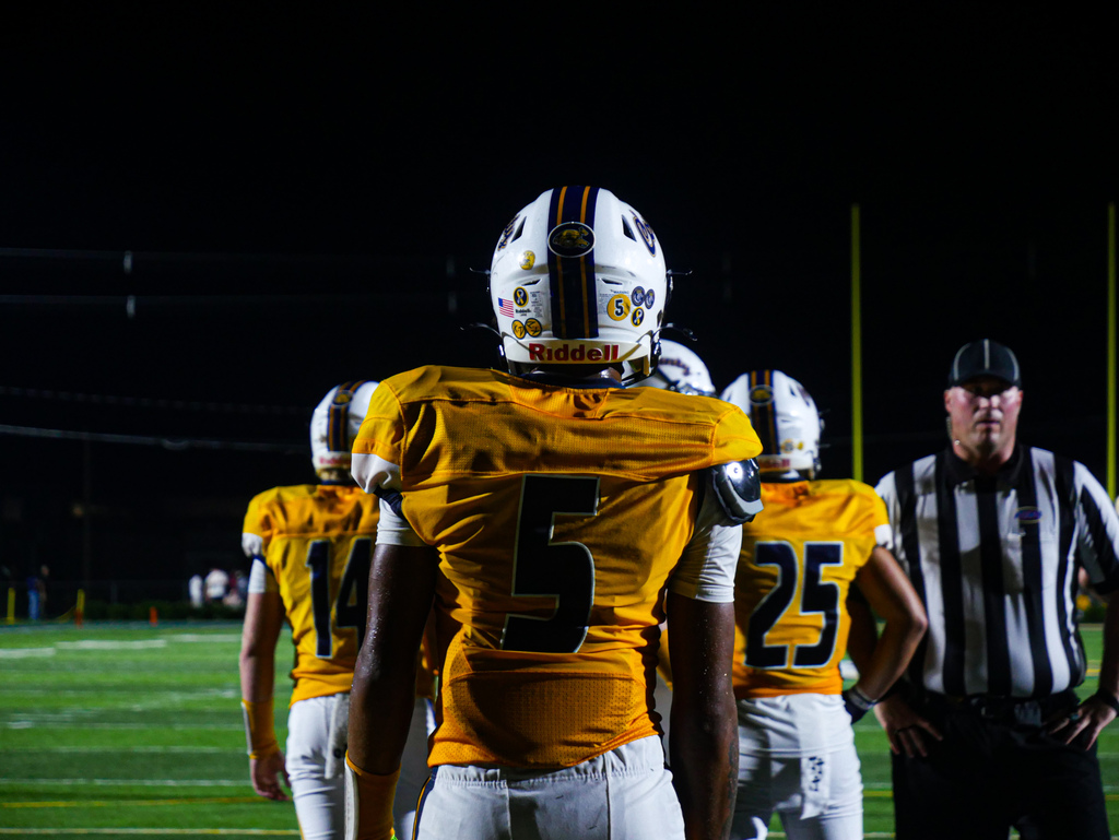 FCHS Football player looks at the field.