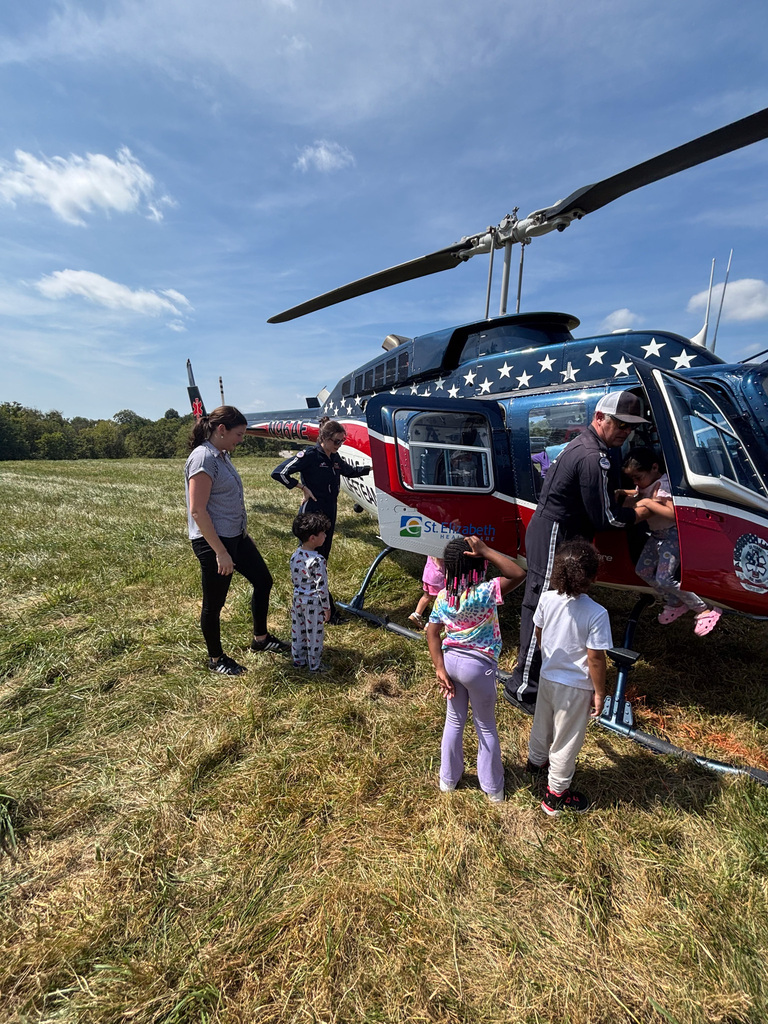 Kids look at medical helicopter