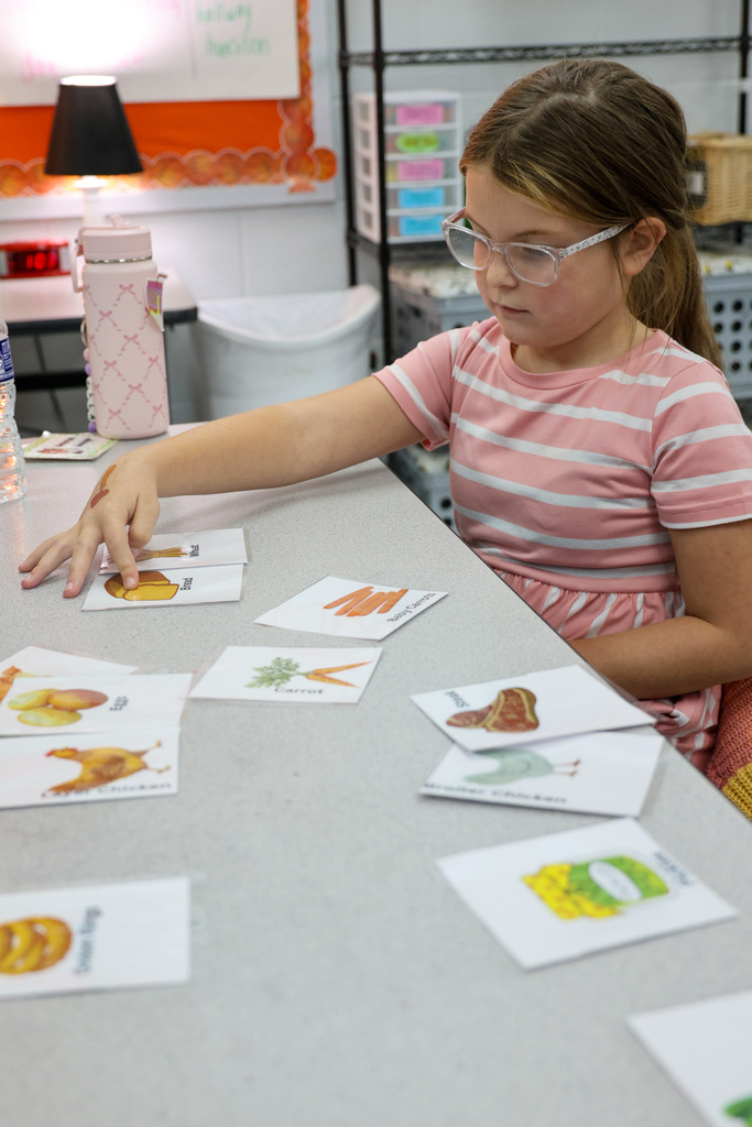 Westridge students participates in activity matching the commodity to the product.