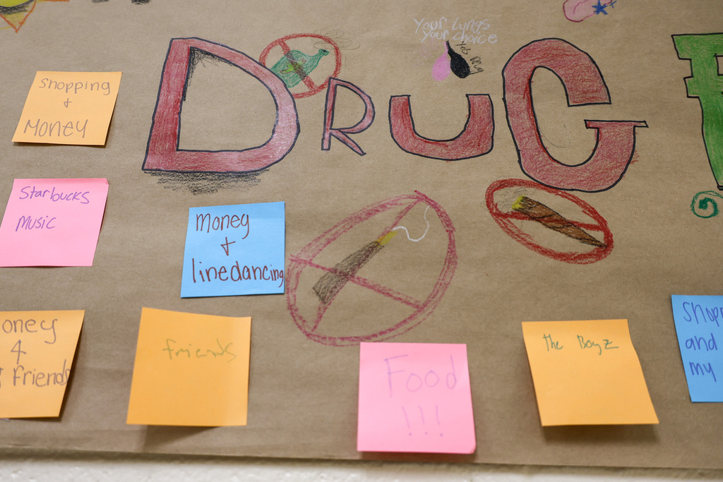 Close up of the drug free poster with a variety of sticky notes explaining their natural high.